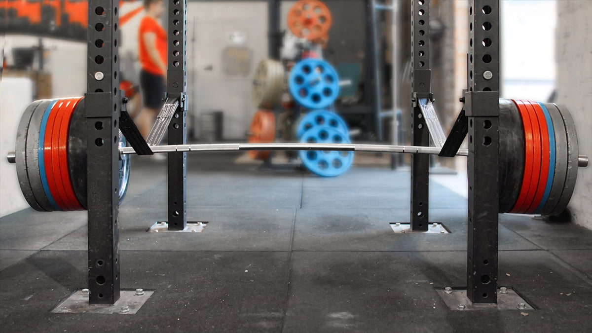 Safety Straps vs. Pin and Pipe Safeties: Which Power Rack Safety System Fits Your Training?